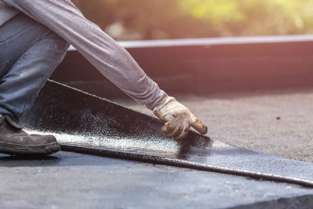Professional Waterproofing technician working in Highland, MI